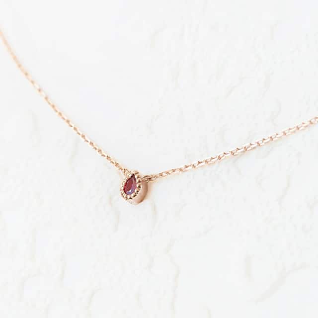 Ruby pear necklace in pink gold